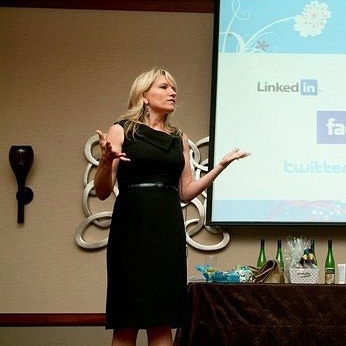 Lei Lydle speaking about online marketing to a group of wedding professionals.